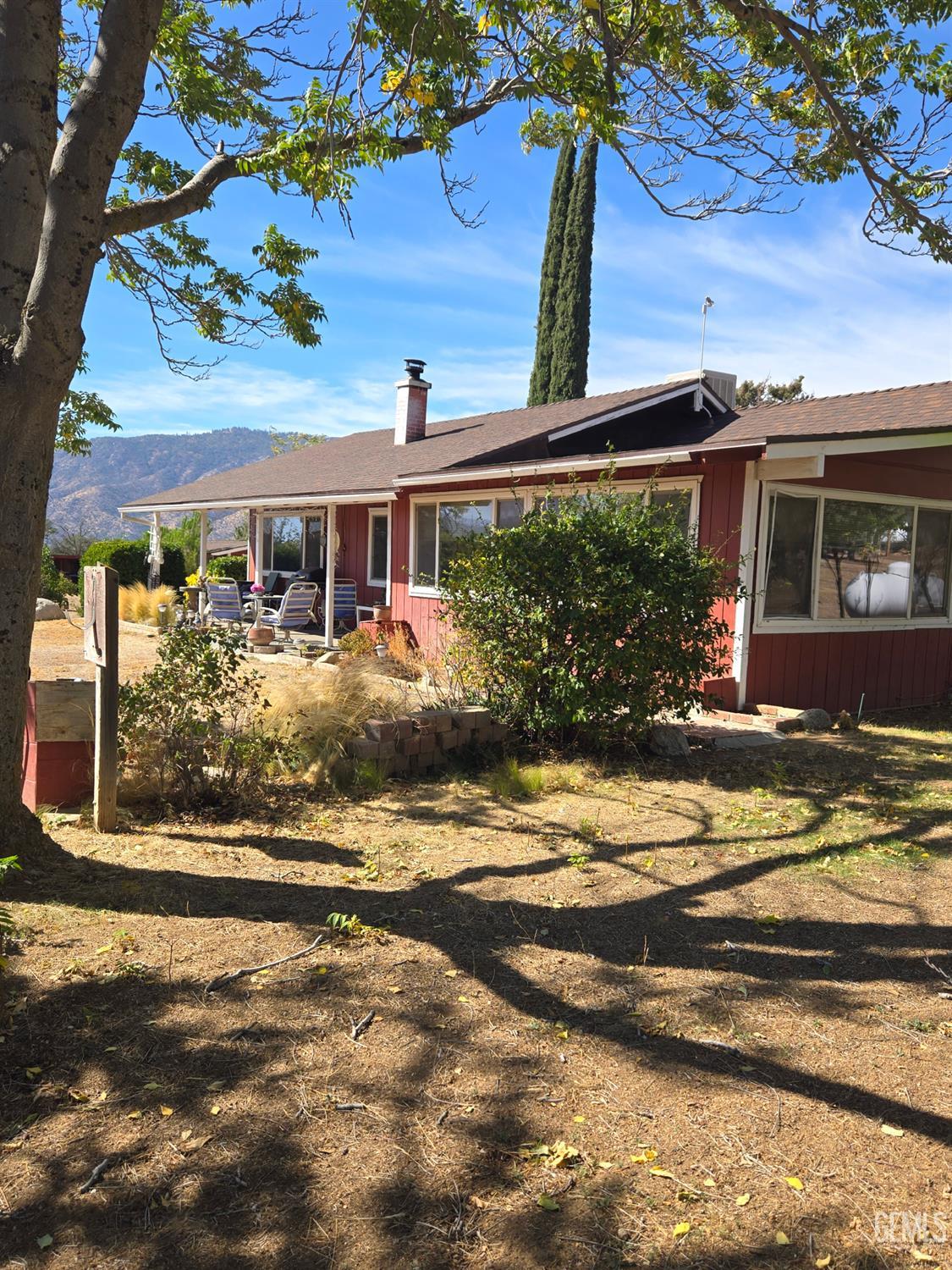 Undisclosed Address Caliente, CA 93518 - Photo 3 of 33 a front view of a house with a yard