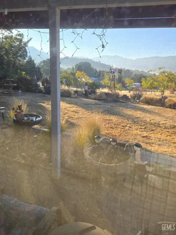 a room with granite countertop lots of counter top space