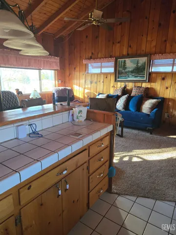 a room with granite countertop lots of counter top space