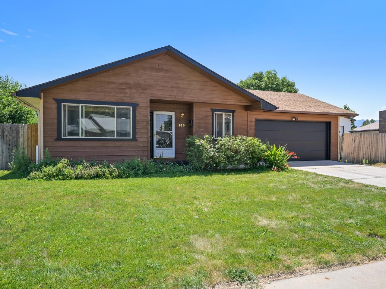 160 Sunset Drive Fruita, CO 81521 - Photo 22 of 22 a front view of house with yard and green space