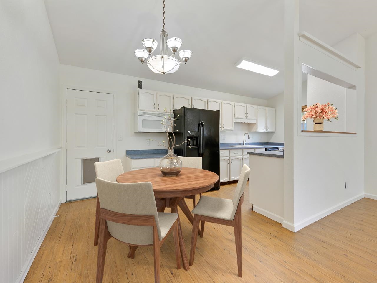 160 Sunset Drive Fruita, CO 81521 - Photo 5 of 22 a view of a dining room with furniture and wooden floor