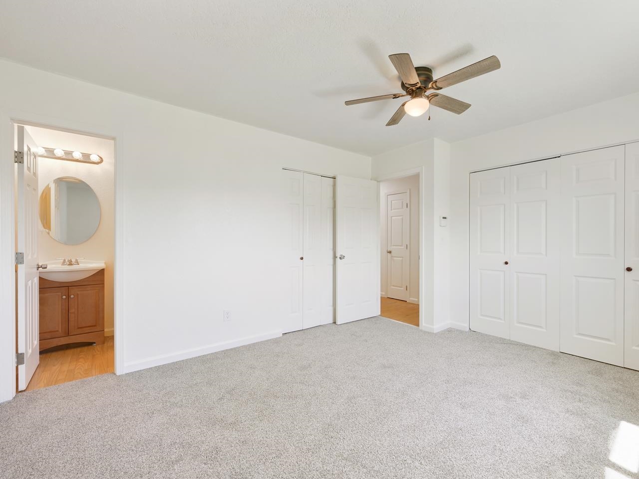 160 Sunset Drive Fruita, CO 81521 - Photo 7 of 22 a view of an empty room with a window