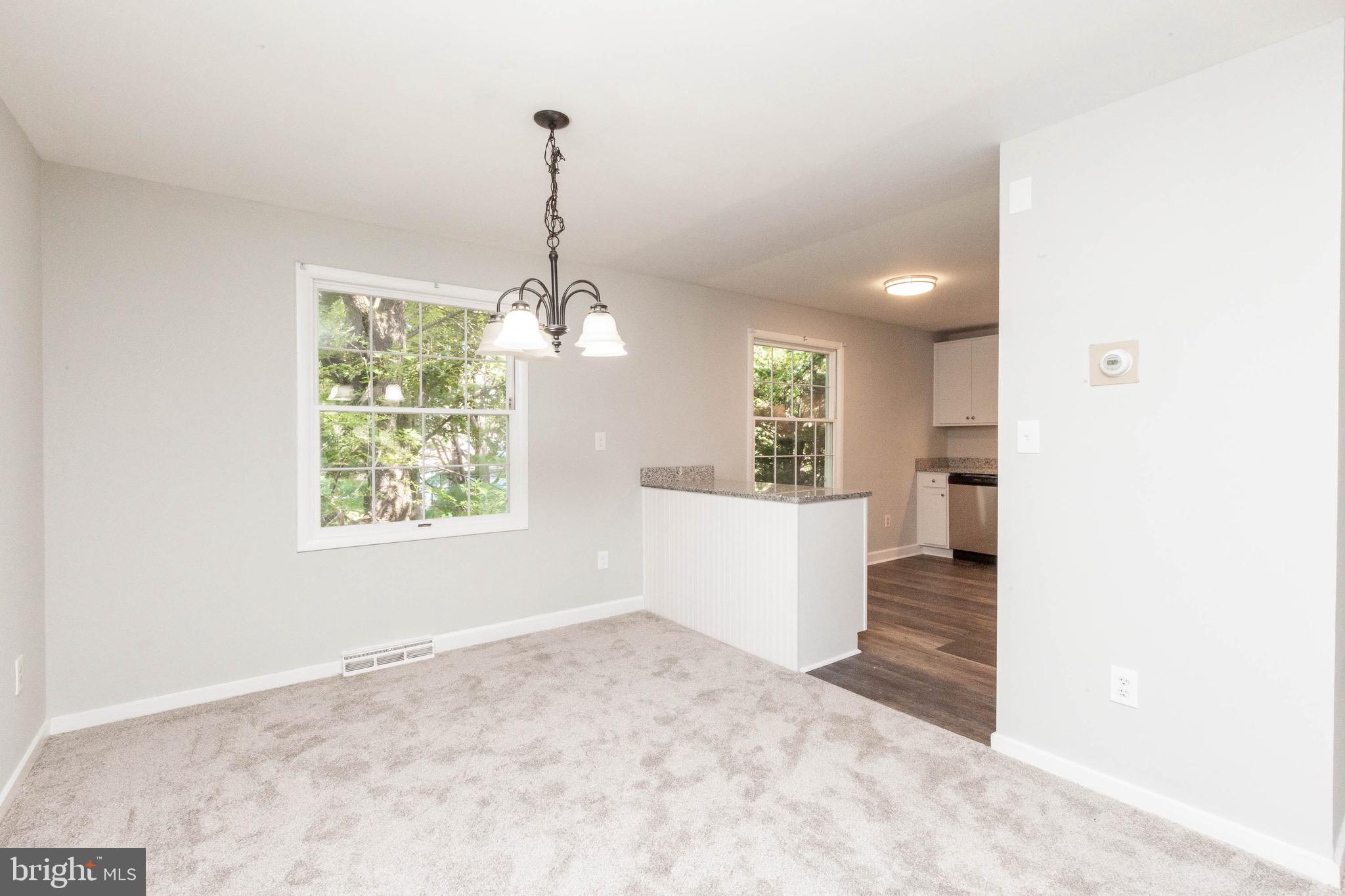 5441 Marsh Hawk Way Columbia, MD 21045 - Photo 8 of 42 Dining room open to kitchen