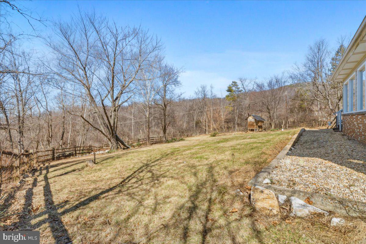 4835 Shookstown Road Frederick, MD 21702 - Photo 2 of 40 a view of yard with tree in the background