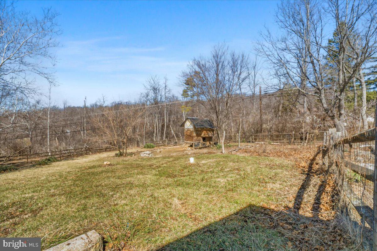 4835 Shookstown Road Frederick, MD 21702 - Photo 34 of 40 a view of yard with swimming pool and seating