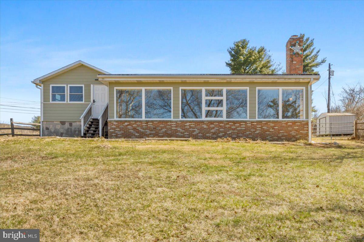 4835 Shookstown Road Frederick, MD 21702 - Photo 38 of 40 a front view of a house with a yard