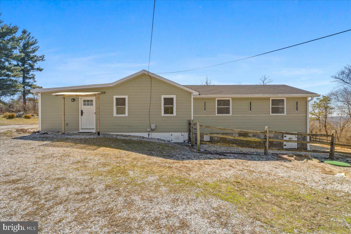 4835 Shookstown Road Frederick, MD 21702 - Photo 39 of 40 a front view of a house with a yard