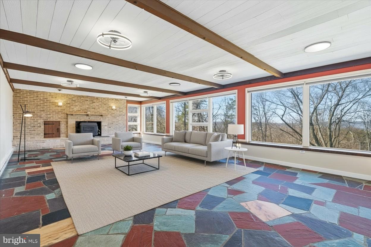 4835 Shookstown Road Frederick, MD 21702 - Photo 4 of 40 a living room with furniture and a large window