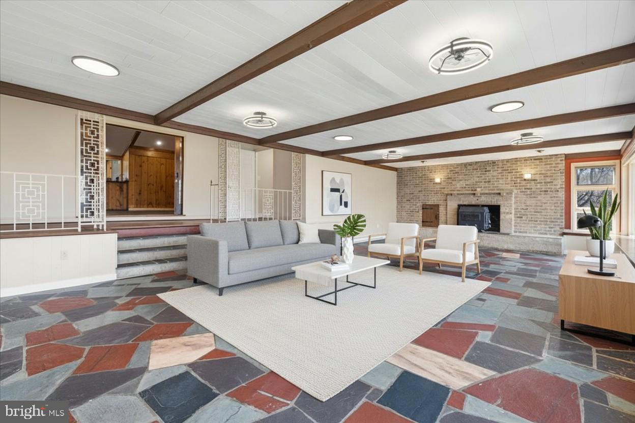 4835 Shookstown Road Frederick, MD 21702 - Photo 6 of 40 a living room with furniture lamp and rug