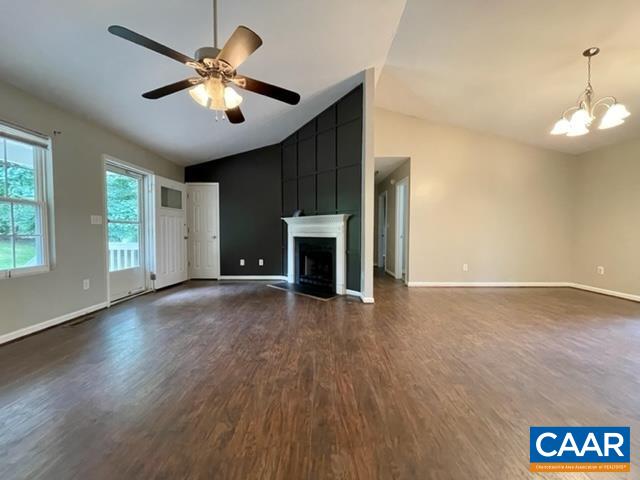 490 Jonquil Road Ruckersville, VA 22968 - Photo 3 of 18 a view of an empty room with wooden floor and a window