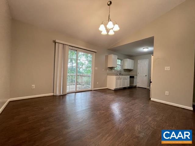 490 Jonquil Road Ruckersville, VA 22968 - Photo 5 of 18 a view of a kitchen with a sink dishwasher and a fireplace