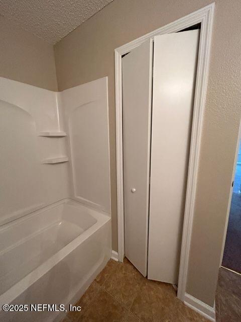 950 Wynfield Circle St. Augustine, FL 32092 - Photo 21 of 30 a bathroom with a bathtub and a shower