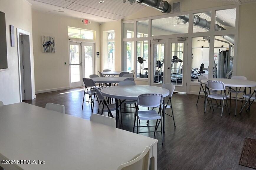 950 Wynfield Circle St. Augustine, FL 32092 - Photo 29 of 30 a view of a dining room with furniture and wooden floor