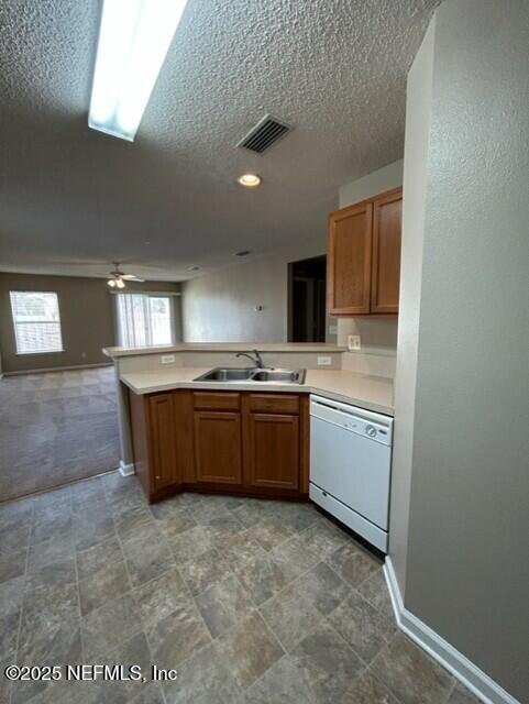 950 Wynfield Circle St. Augustine, FL 32092 - Photo 7 of 30 a kitchen with a sink a stove top oven and cabinetry