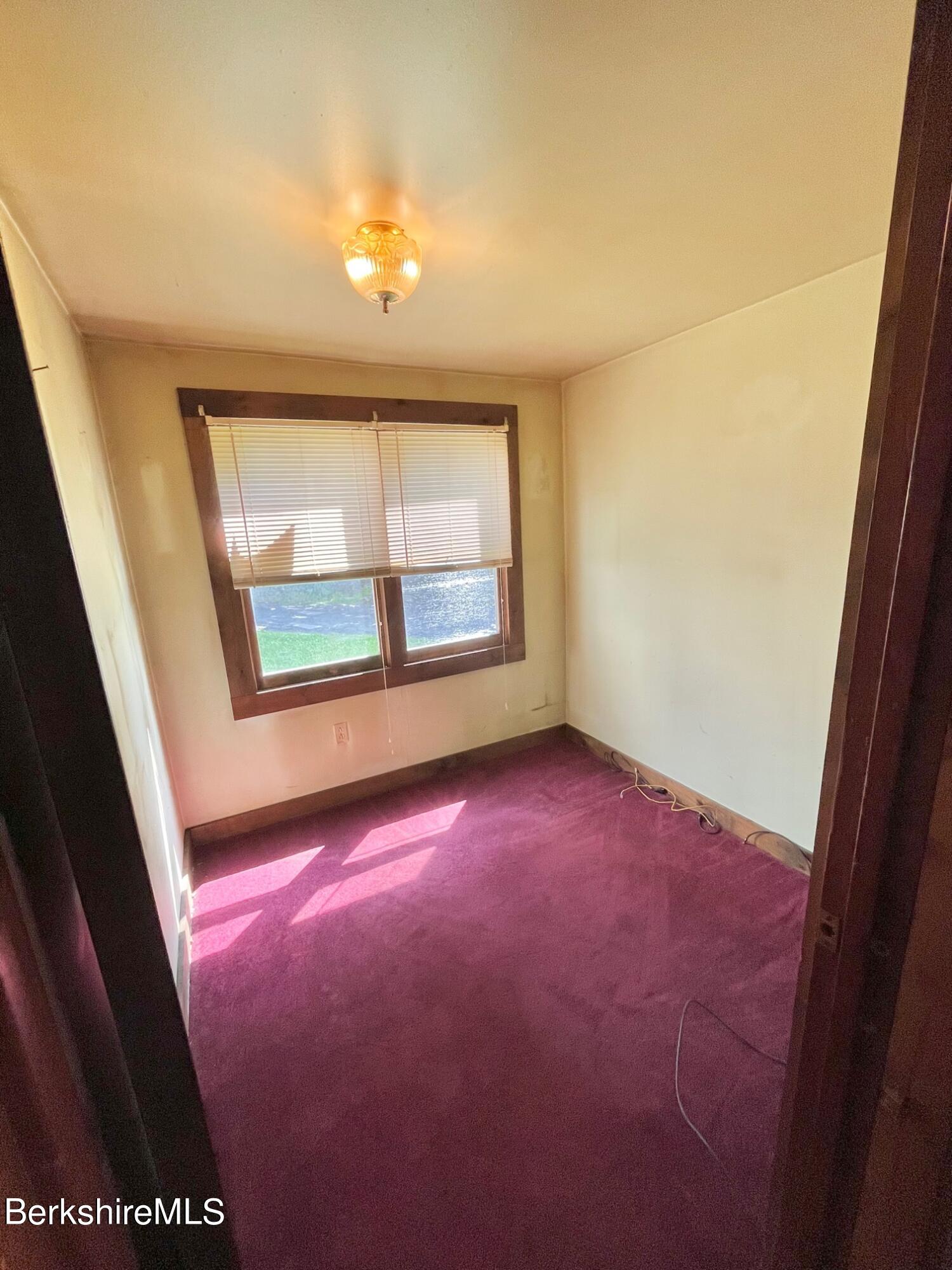 21 Ray Street North Adams, MA 01247 - Photo 13 of 27 an empty room with a window