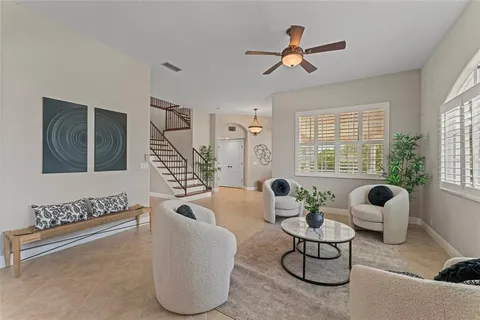 a view of kitchen with sink dining table and chairs