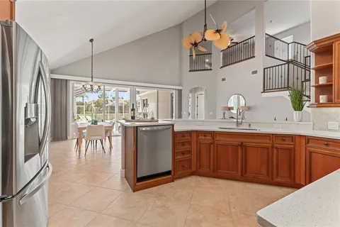 a living room with furniture a rug and white walls