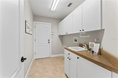 a view of a livingroom with a ceiling fan and window