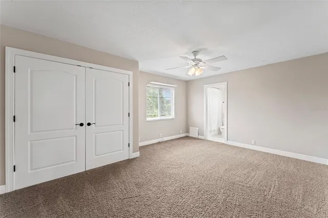 an aerial view of a city with ocean view