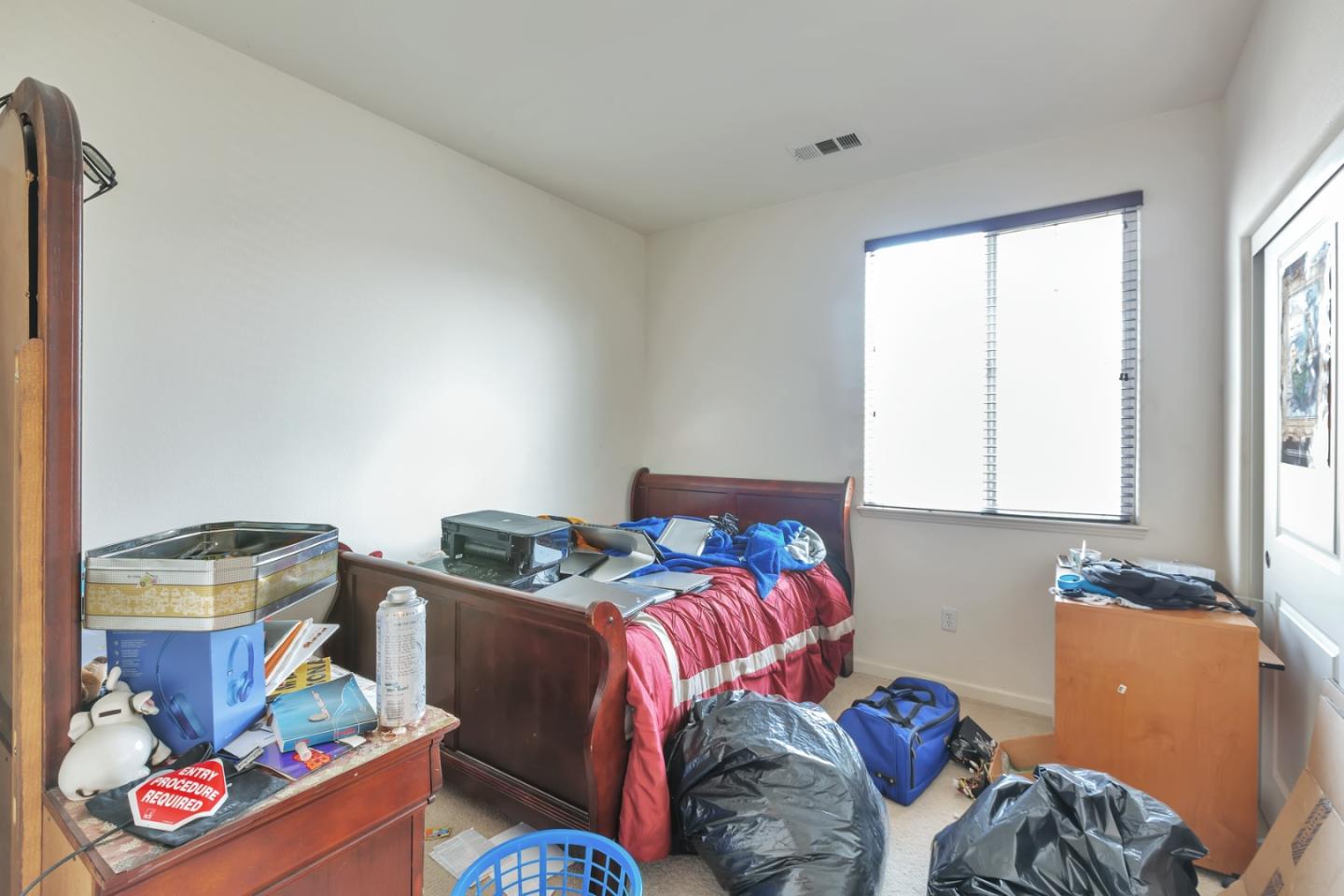 22860 Mono Street Hayward, CA 94541 - Photo 13 of 26 a bedroom with bed and a window