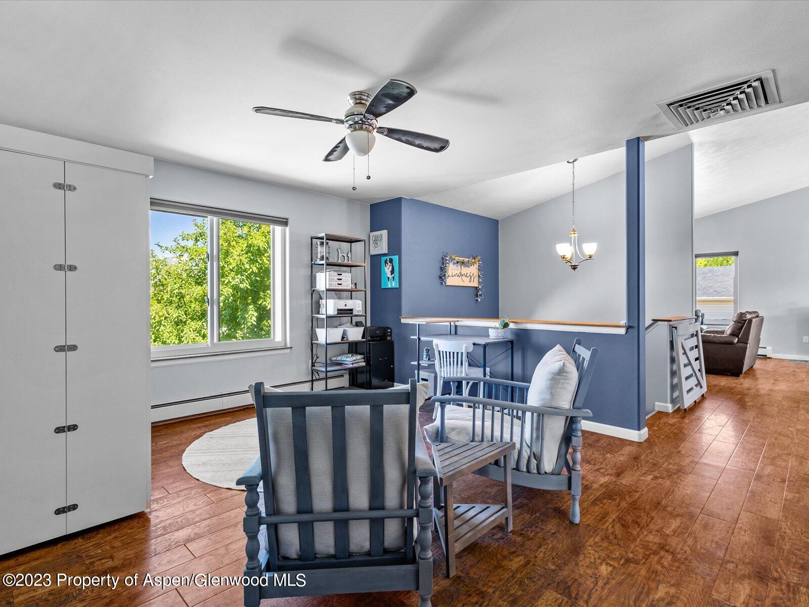 1562 Anvil View Avenue Rifle, CO 81650 - Photo 12 of 26 a view of a dining room with furniture window and outside view