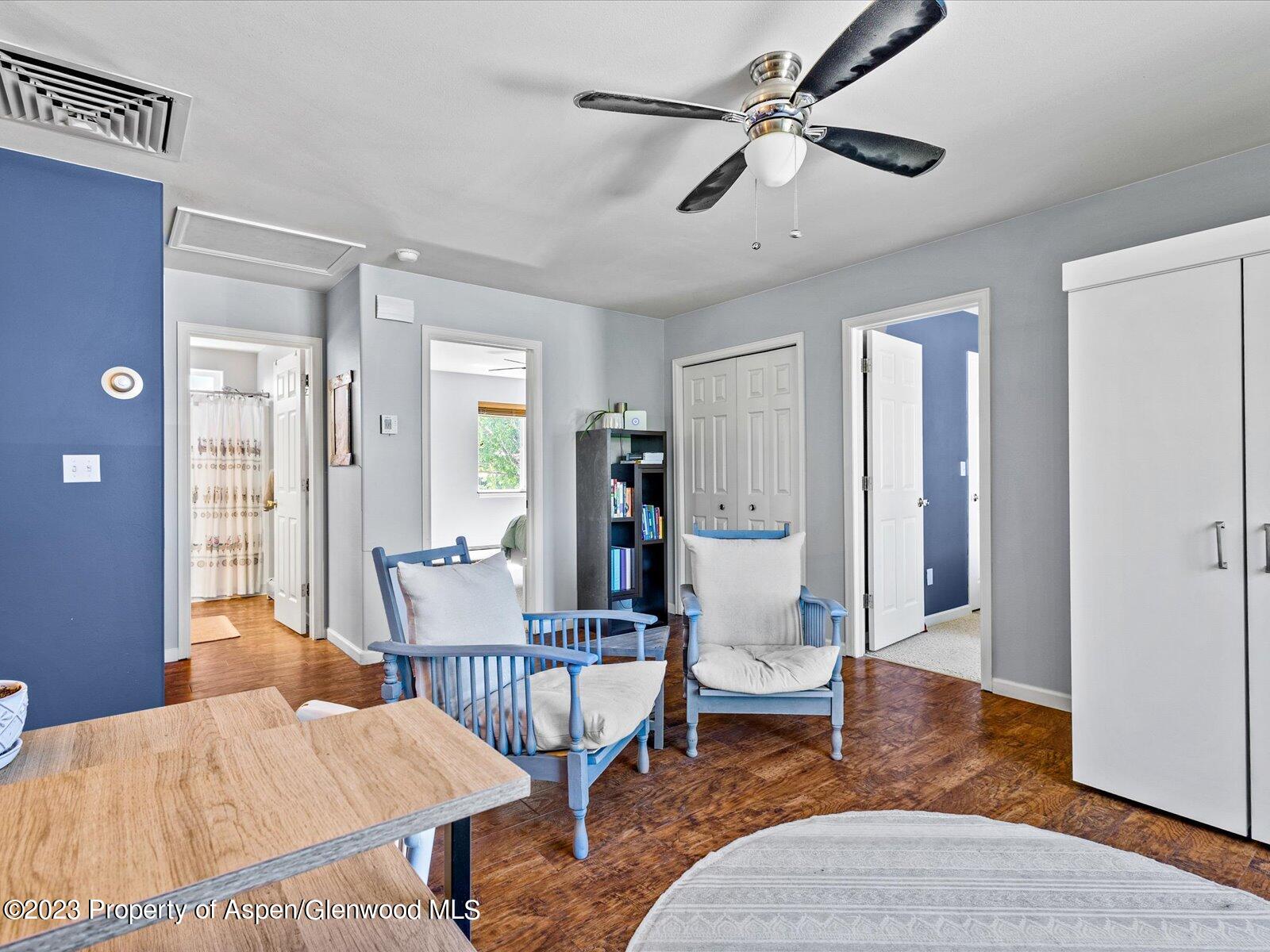 1562 Anvil View Avenue Rifle, CO 81650 - Photo 13 of 26 a living room with furniture and wooden floor