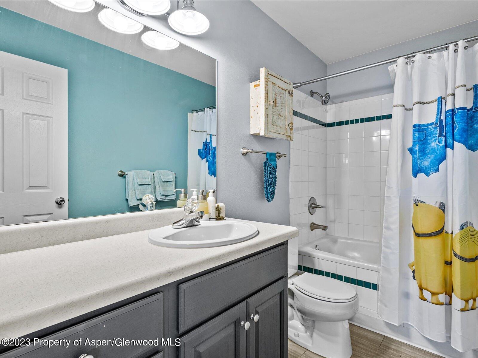 1562 Anvil View Avenue Rifle, CO 81650 - Photo 16 of 26 a bathroom with a sink toilet and shower