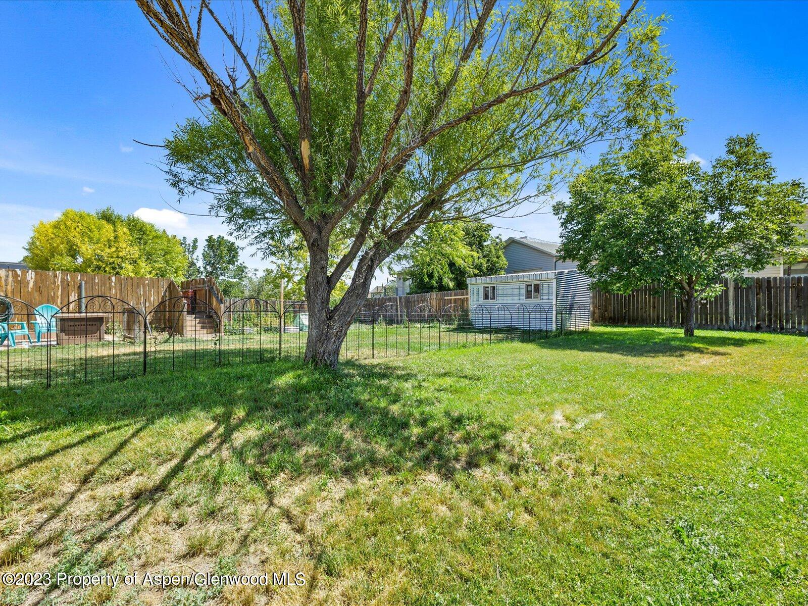 1562 Anvil View Avenue Rifle, CO 81650 - Photo 25 of 26 a view of a house with a yard