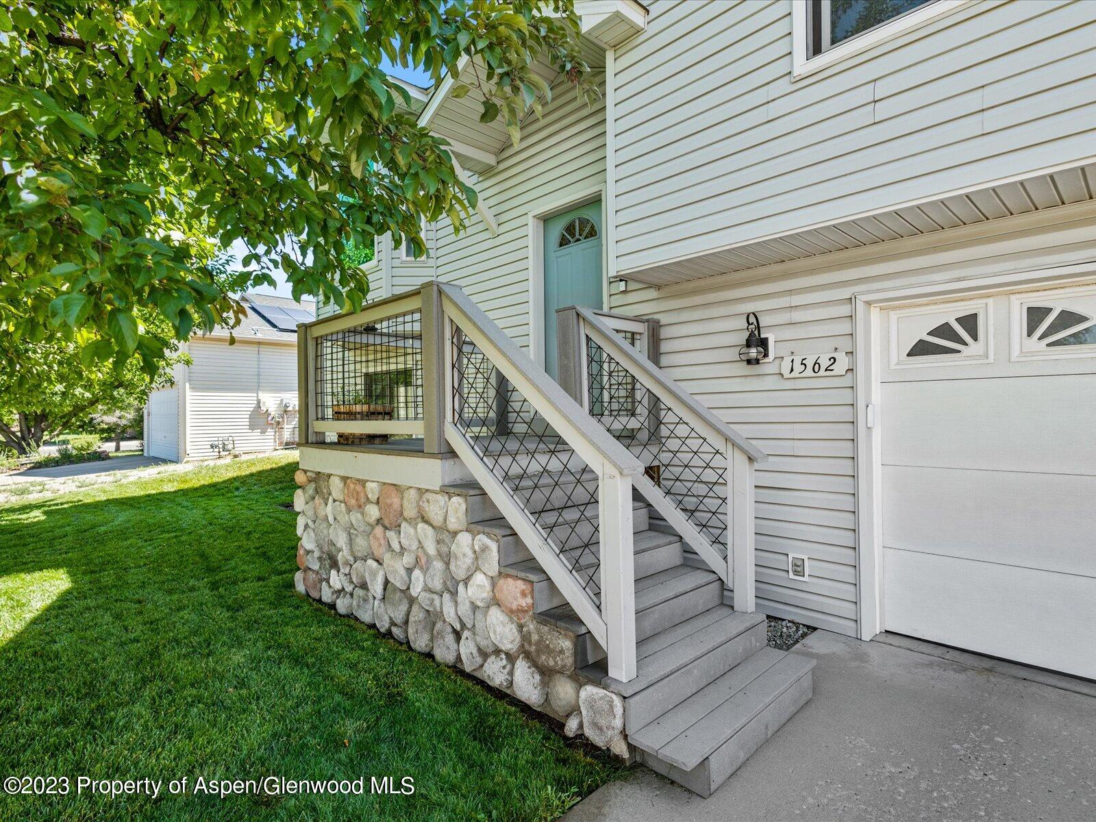 1562 Anvil View Avenue Rifle, CO 81650 - Photo 4 of 26 a view of a house with a yard