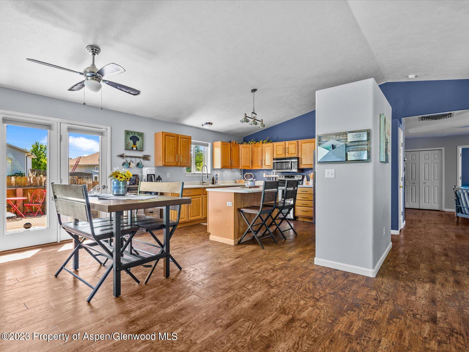 1562 Anvil View Avenue Rifle, CO 81650 - Photo 6 of 26 a view of a dining room with furniture