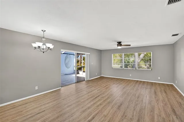 a view of an empty room with a balcony