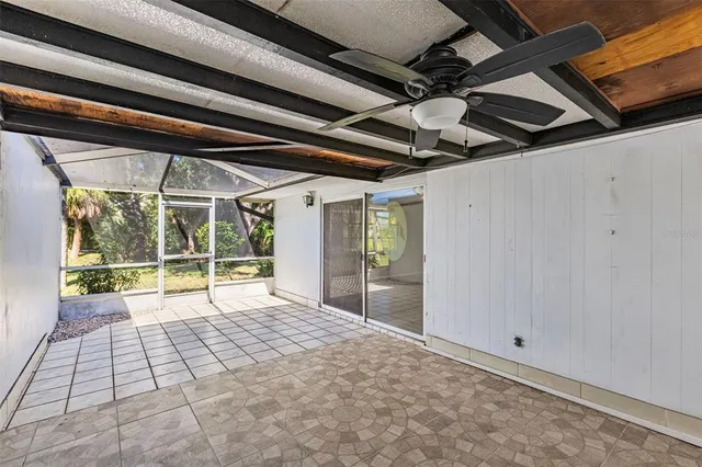 a view of an house with backyard space and garden