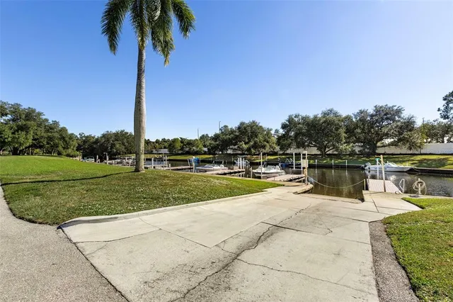 a view of a lake with a big yard