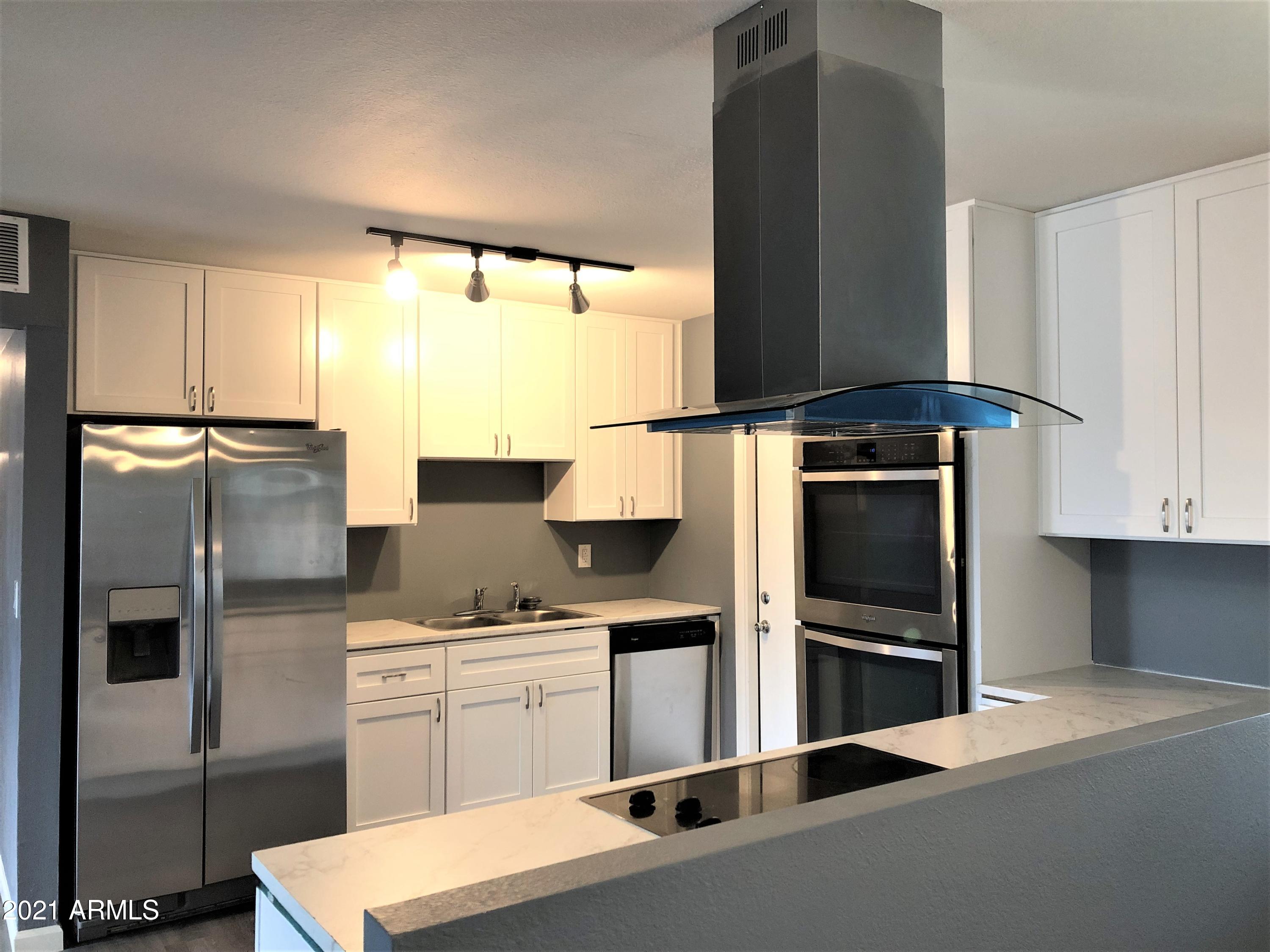 3141 West Charter Oak Road Phoenix, AZ 85029 - Photo 5 of 19 Light and bright kitchen