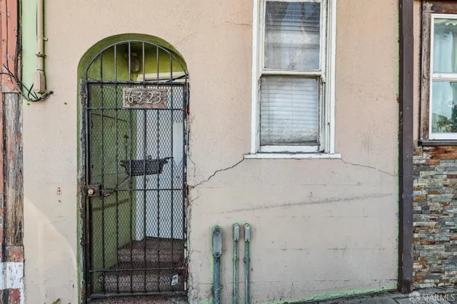a bathroom with a sink a mirror and shower