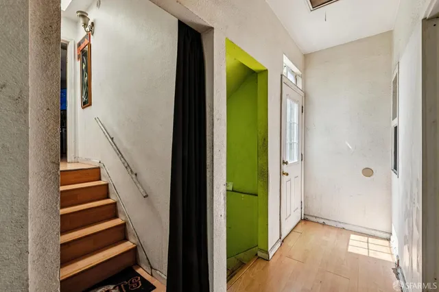 a view of an entryway with staircase