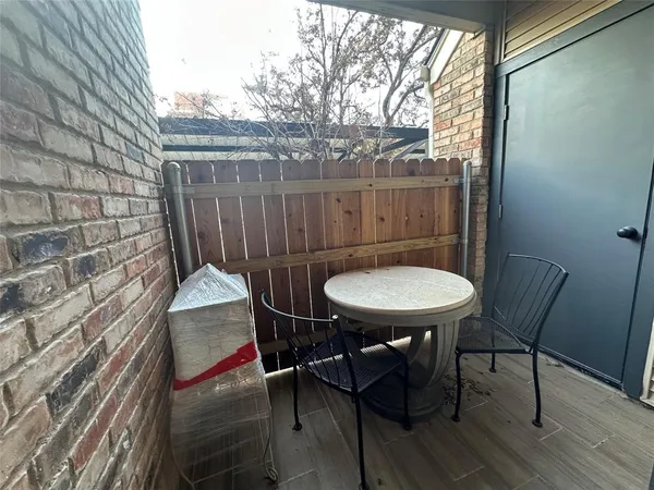 a view of a outdoor seating area with furniture
