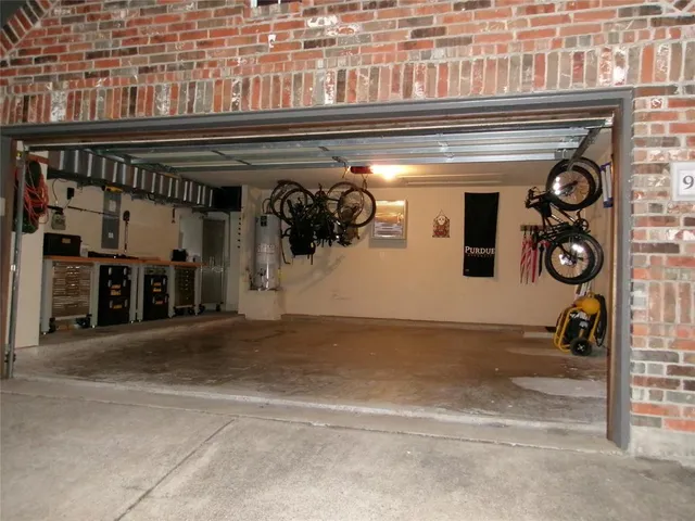 a view of a livingroom with workspace and a couch