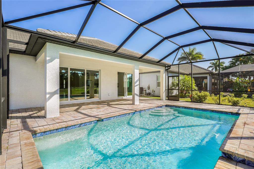 19803 Bridgetown Loop Venice, FL 34293 - Photo 22 of 51 a view of a house with backyard porch and sitting area