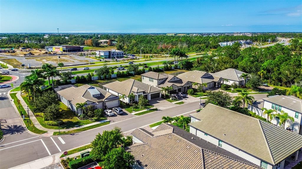 19803 Bridgetown Loop Venice, FL 34293 - Photo 23 of 51 an aerial view of a house with a garden