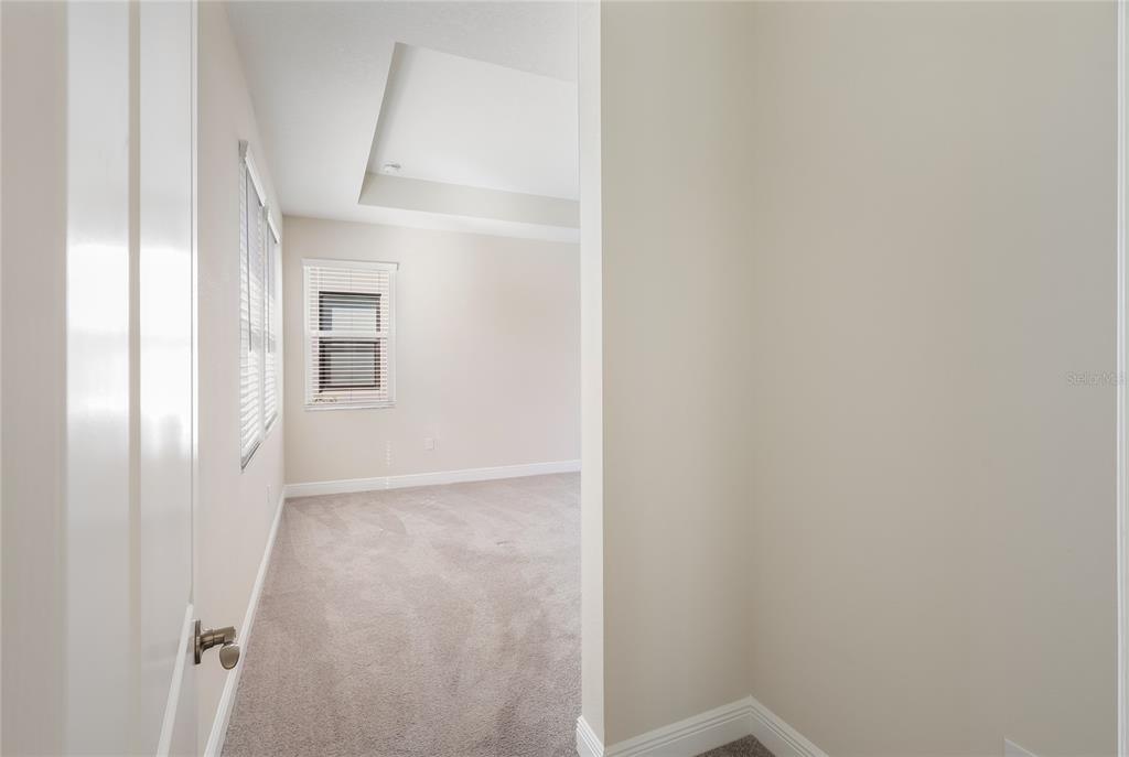 19803 Bridgetown Loop Venice, FL 34293 - Photo 24 of 51 a view of hallway with closet and a white door