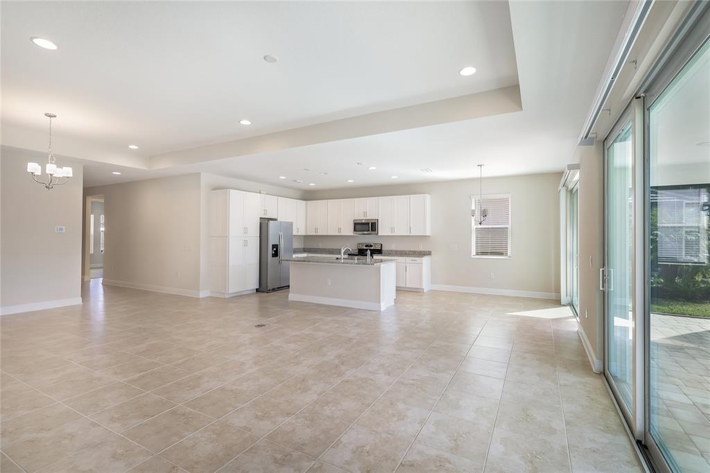 19803 Bridgetown Loop Venice, FL 34293 - Photo 25 of 51 a view of a kitchen with a sink and refrigerator