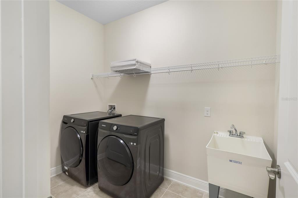 19803 Bridgetown Loop Venice, FL 34293 - Photo 35 of 51 a utility room with dryer and washer