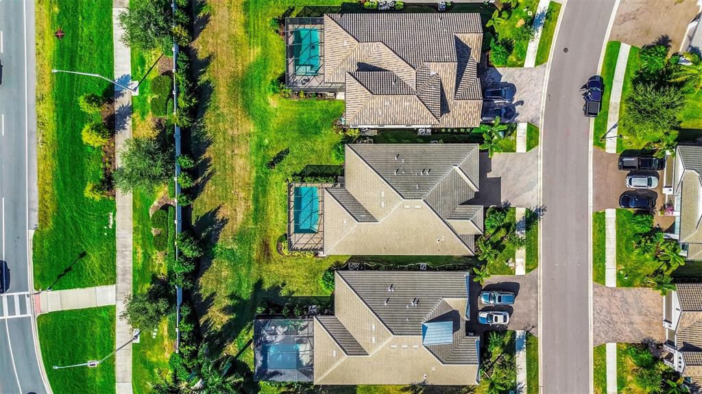 19803 Bridgetown Loop Venice, FL 34293 - Photo 38 of 51 an aerial view of a house with garden space and street view