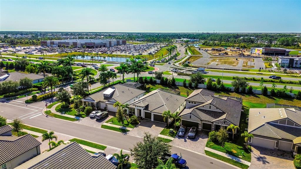 19803 Bridgetown Loop Venice, FL 34293 - Photo 45 of 51 an aerial view of a house with a garden