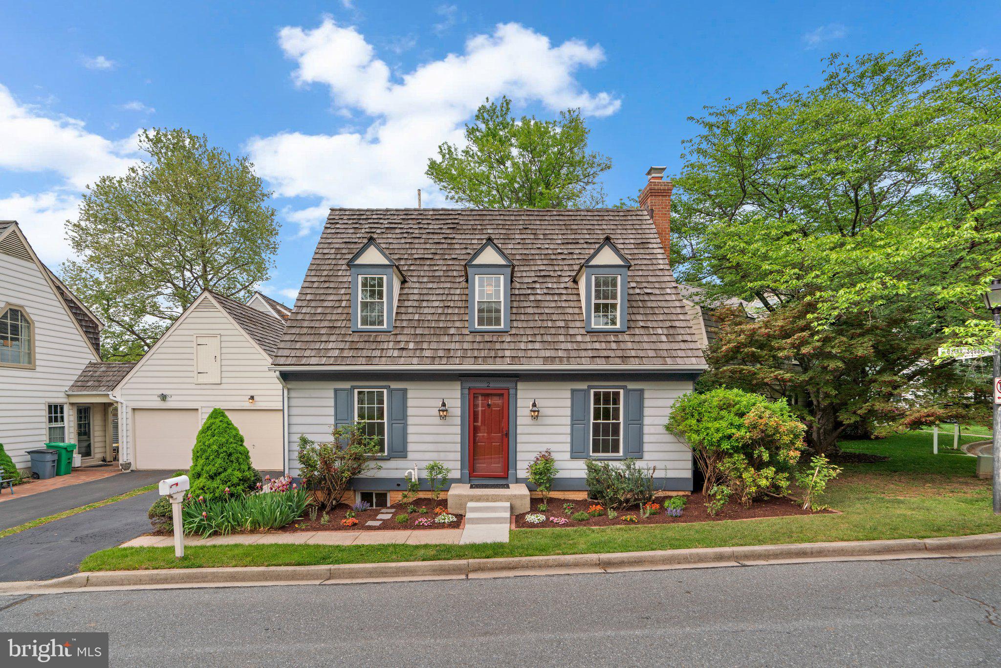 2 Oxley Square Road Gaithersburg, MD 20877 - Photo 1 of 49 a front view of a house with a garden and plants
