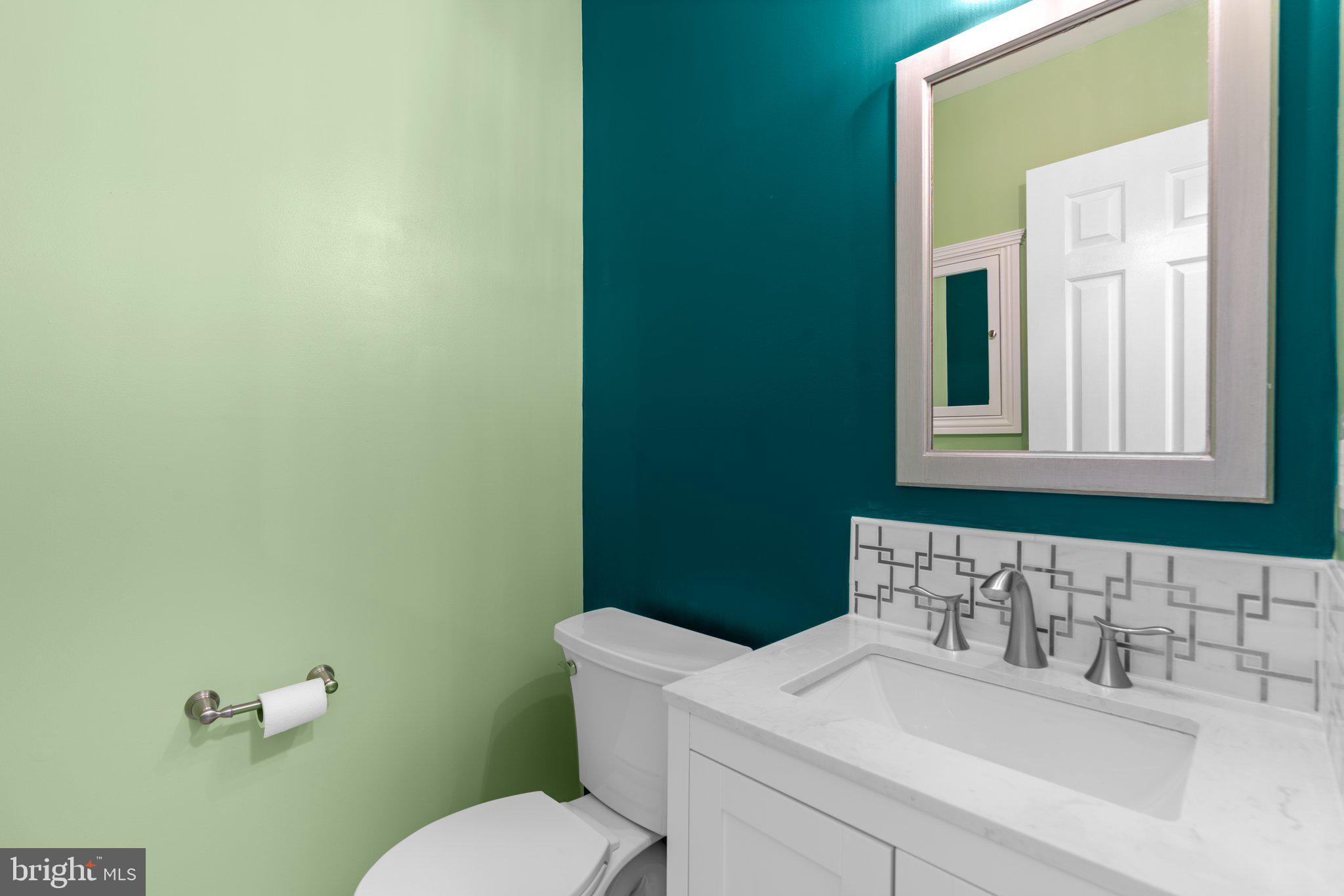 2 Oxley Square Road Gaithersburg, MD 20877 - Photo 17 of 49 a bathroom with a sink and a toilet