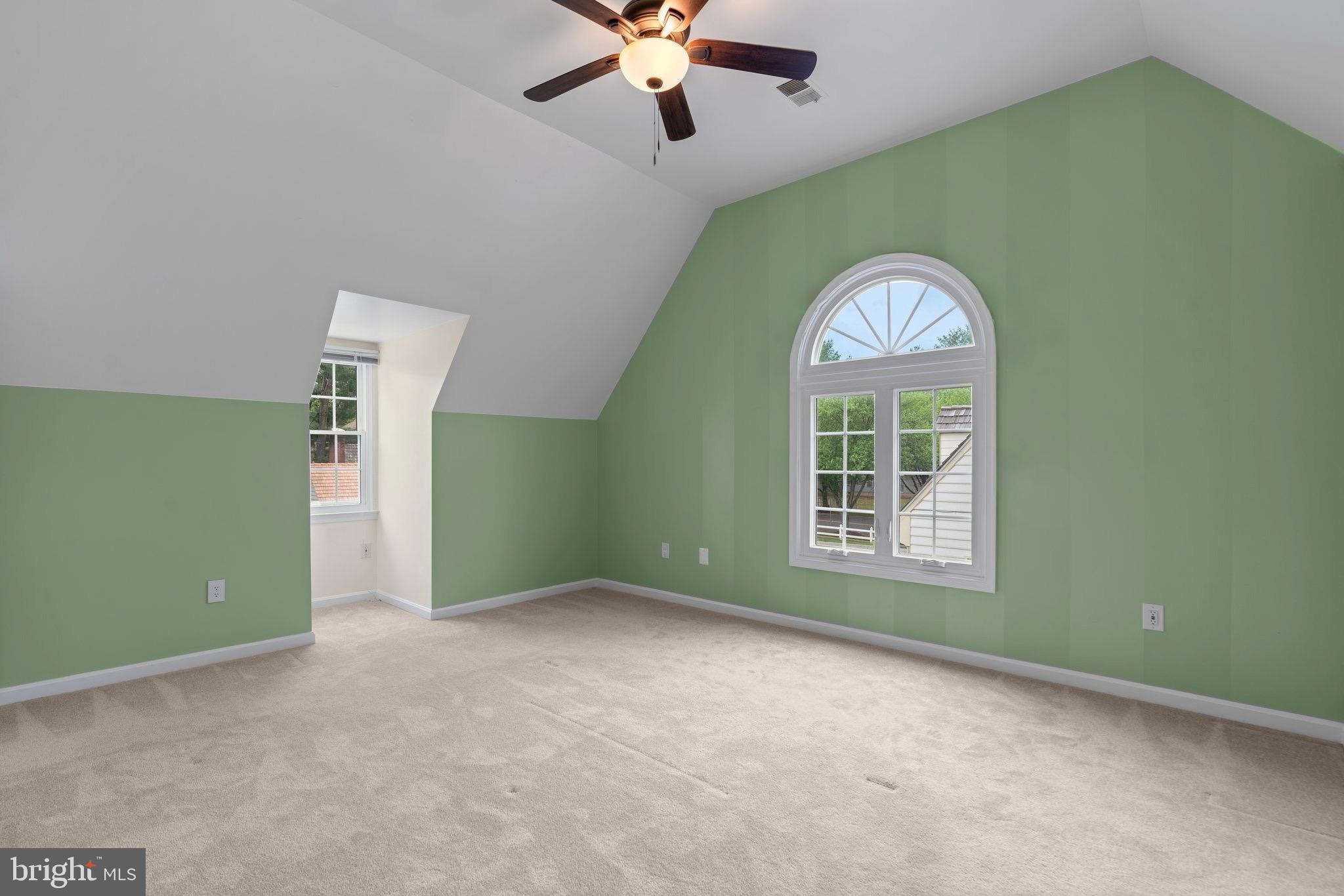 2 Oxley Square Road Gaithersburg, MD 20877 - Photo 19 of 49 an empty room with a window and a ceiling fan