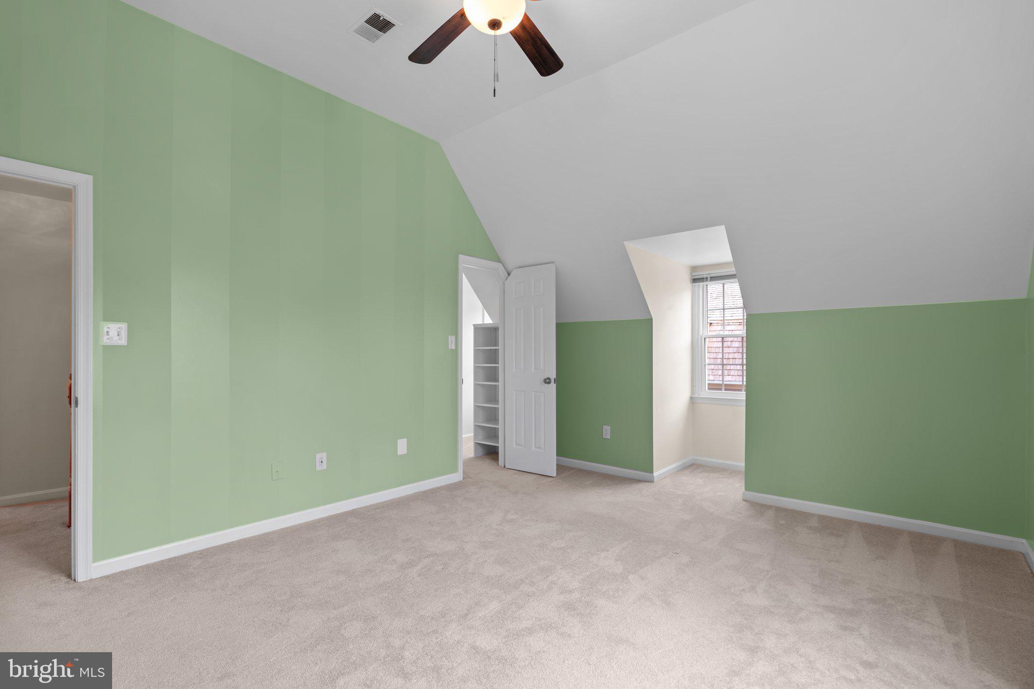 2 Oxley Square Road Gaithersburg, MD 20877 - Photo 20 of 49 an empty room with ceiling fan and window