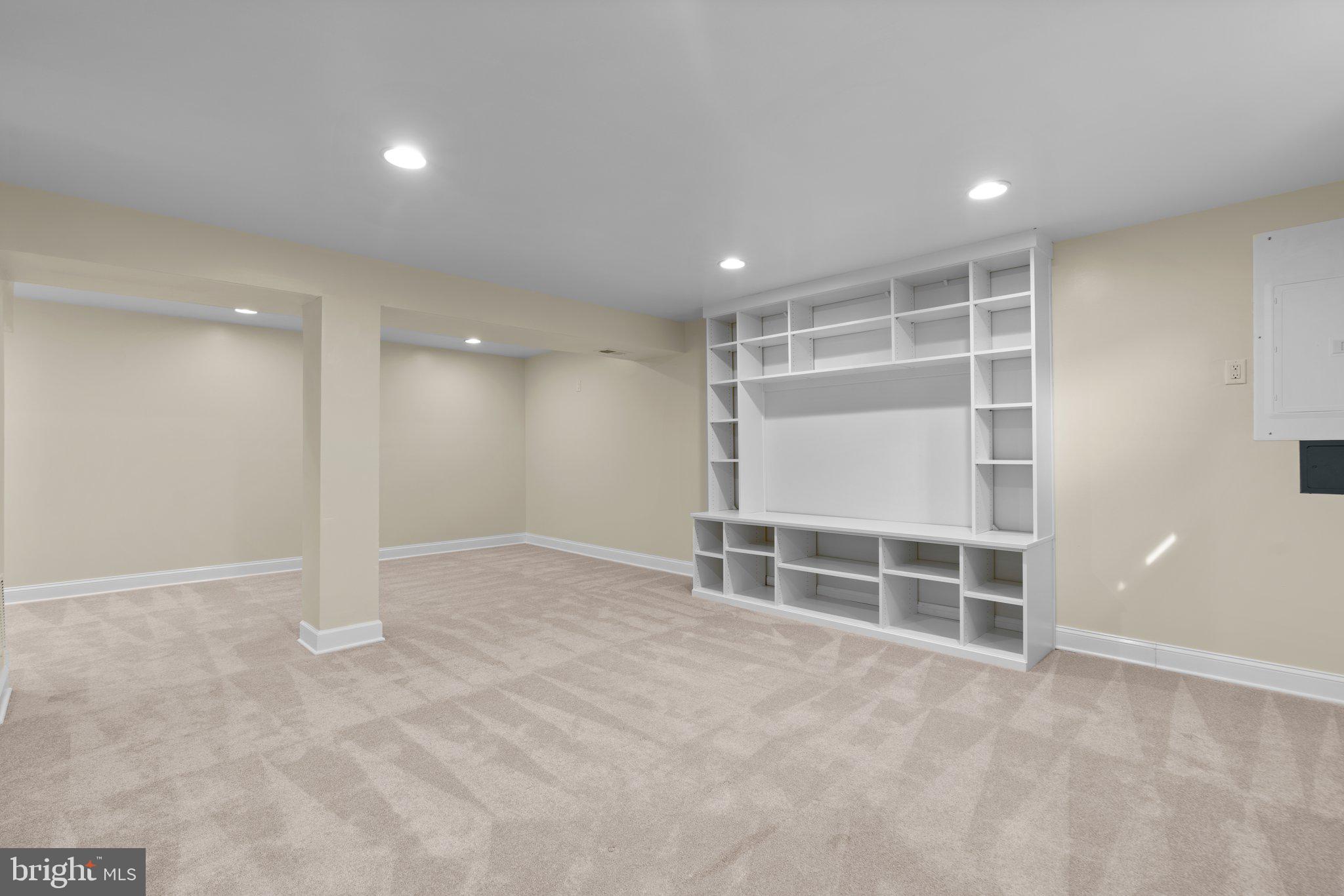 2 Oxley Square Road Gaithersburg, MD 20877 - Photo 32 of 49 a view of an empty room with wooden floor and windows